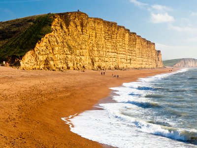 The towering cliffs at West Bay on the Jurassic Coast of Dorset, England