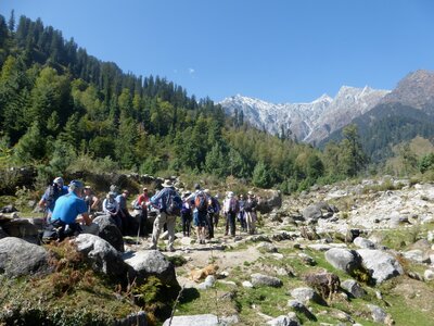 Ramble Worldwide walking group surrounded by pine trees and mountains, Hill Stations of The Himalayas