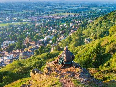 Traveller overlooking Great Malvern, from the Malvern Hills, Worcestershire, England