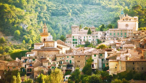 Traditional town among the forested hills of Majorca in the Balearic Islands, Spain
