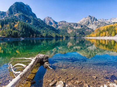 Reflection of lake at estany de Sant Maurici, Aiguestortes and Sant Maurici National Park, Lleida, Catalonia, Spain