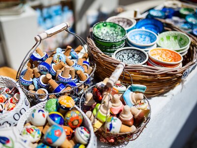 Close up of colourful ceramic souvenirs at market in Greece