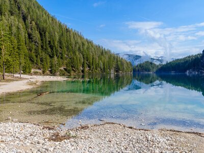 Landscape of Lake Braies in the Dolomites among mountains, Italy