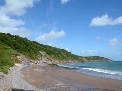 Man sands beach near Brixham and part of the South West coastal path route on a blustery day