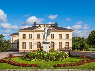 Statue and garden in front of the Drottningholm Palace theatre in Stockholm, Sweden