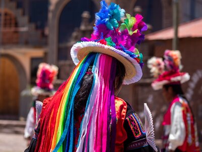 Culture of Taquile Island showcasing colourful hat and textiles worn by local, Lake Titicaca in Peru