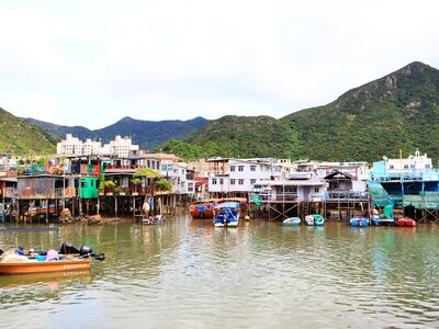 Fishing boats on waterway and floating stilt houses at Tai O, Hong Kong