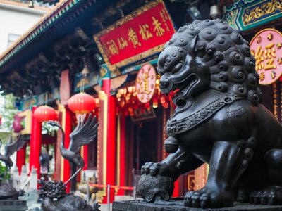 Close up of Lion Guardian bronze sculpture at the Sik Sik Yuen Wong Tai Sin Temple in Kowloon, Hong Kong