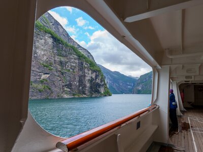 View of Norwegian fjords through Fred Olsen cruise window on Ramble Worldwide walking holiday The Fjords of Norwar