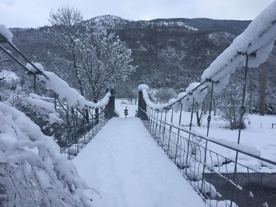 Snow-covered bridge, Spain, Snowshoeing in the Spanish Pyrenees