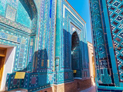 Ensemble of Shahi-Zinda mausoleums which have intricate patterns on blue-tiles that decorate the archway entrances and walls, Samarkand, Uzbekistan