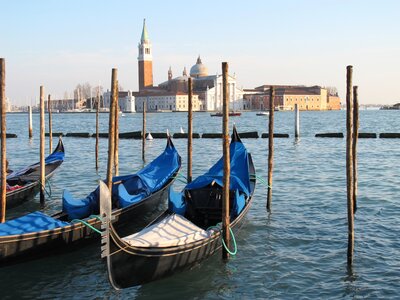 Gondolas in Venice and isle of San Giorgio Maggiore view from St Mark's Square, Italy