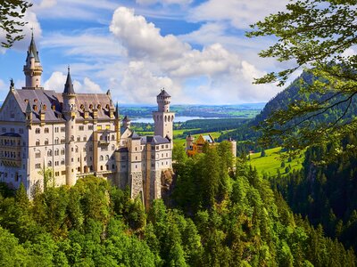 Neuschwanstein Castle in Bavarian Alps mountains during summertime, Bavaria, Germany